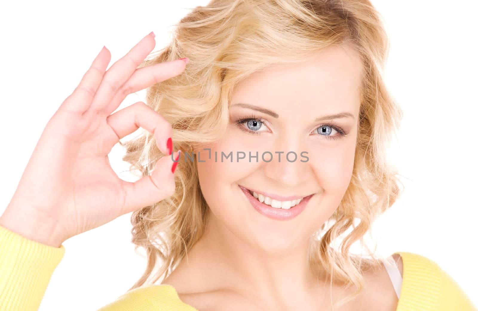 bright picture of lovely blonde showing ok sign