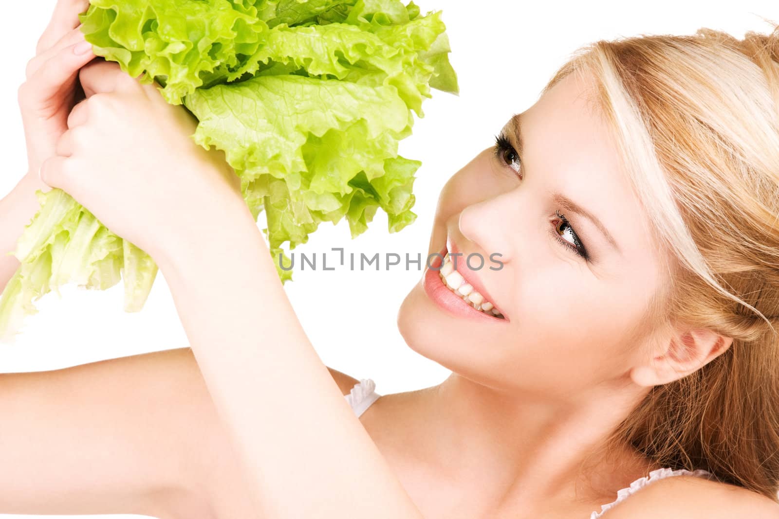 picture of happy woman with lettuce over white