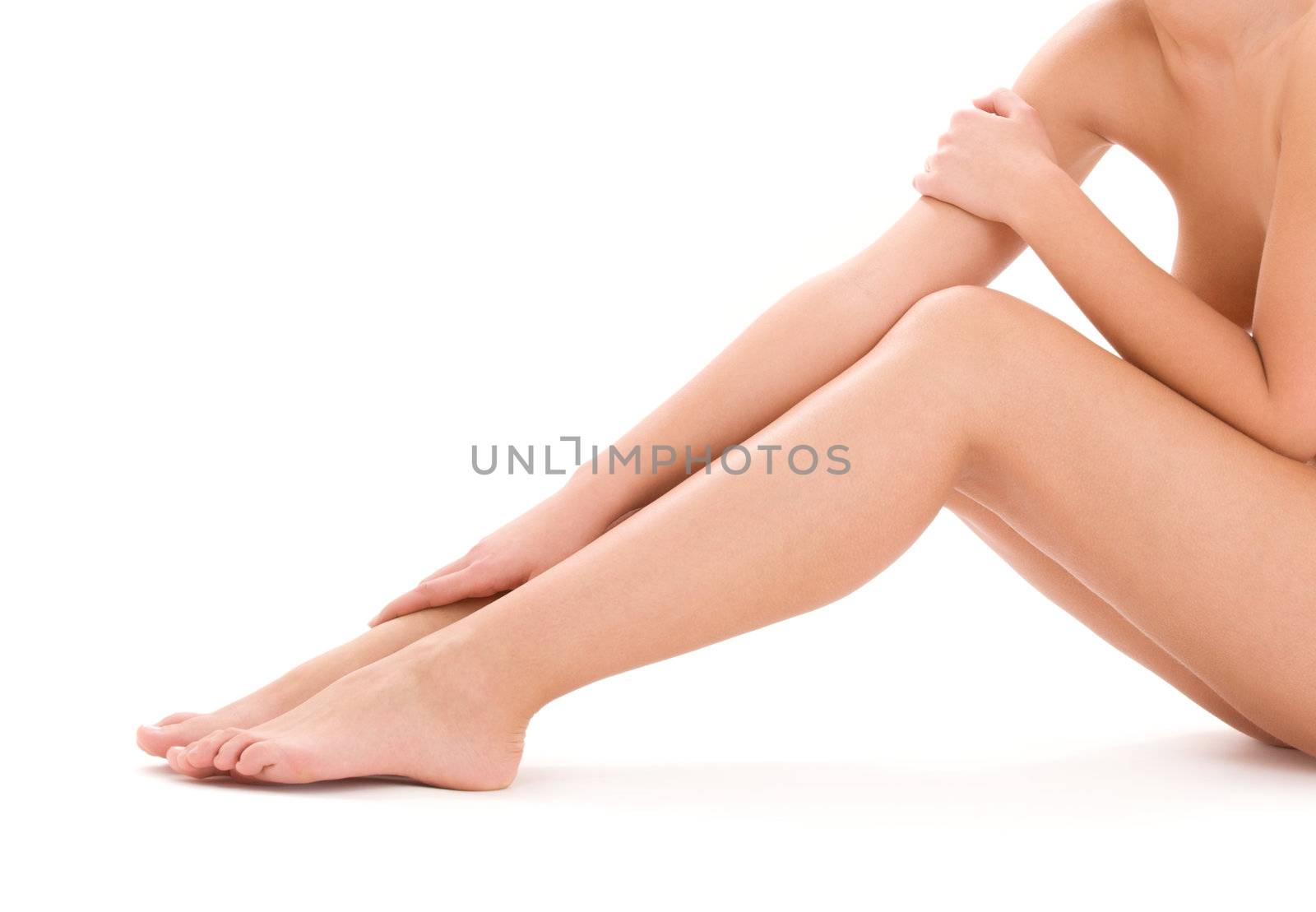 picture of healthy naked woman legs over white