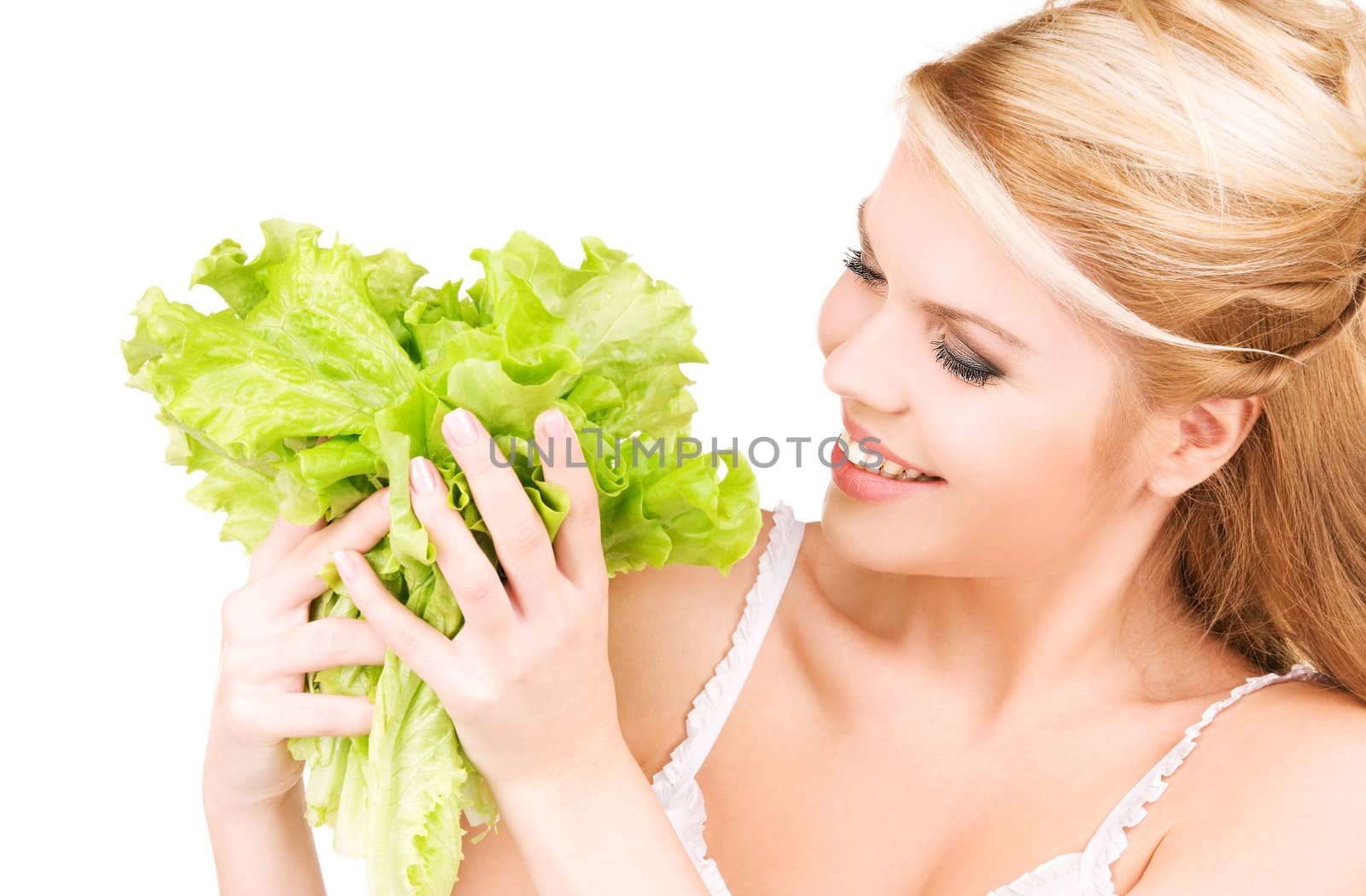 picture of happy woman with lettuce over white