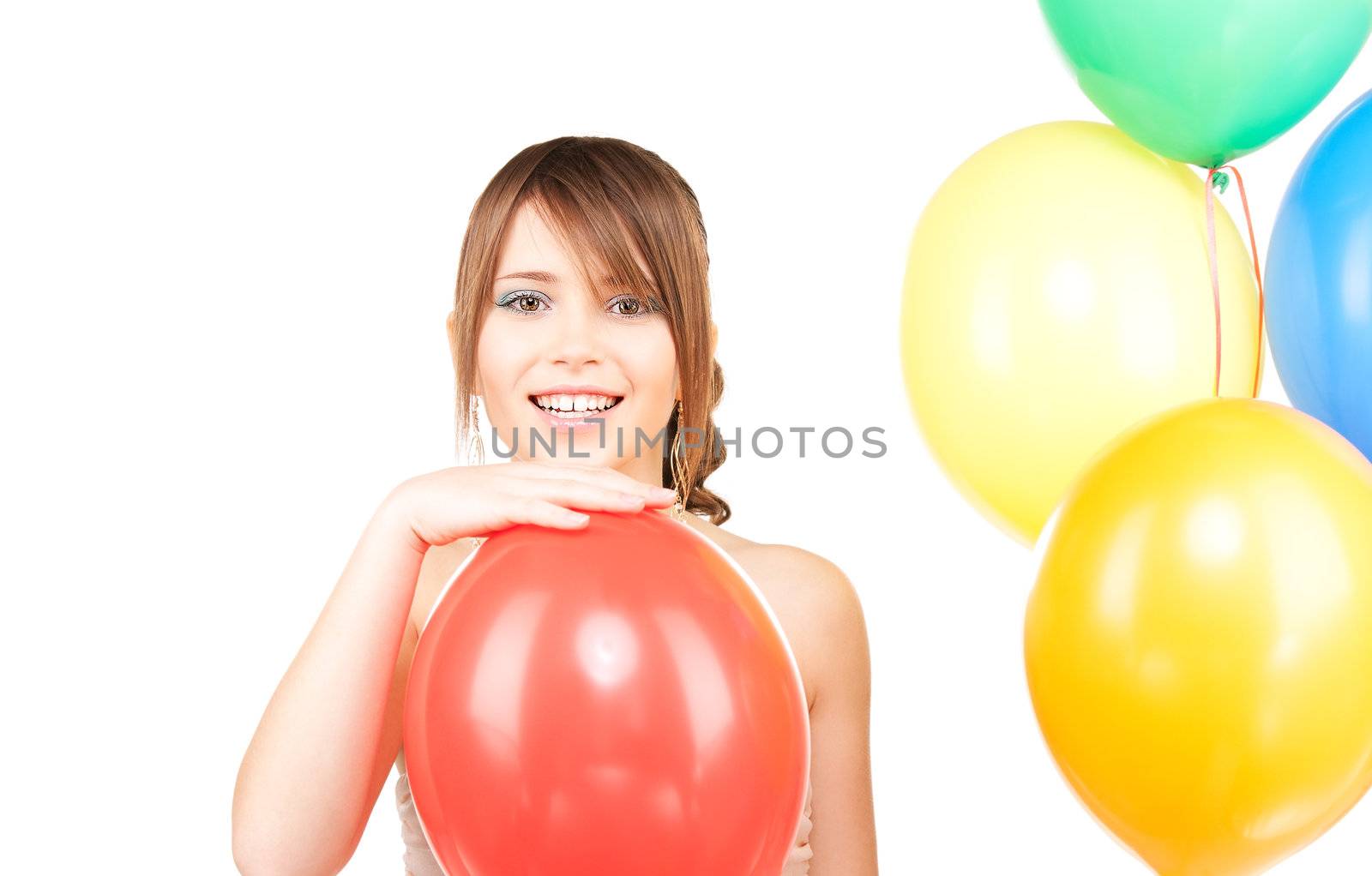 happy teenage girl with balloons over white