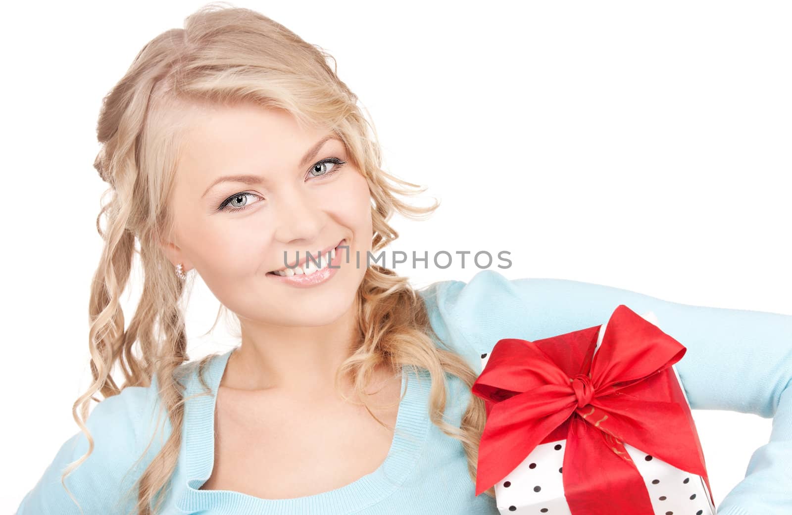 happy girl with gift box over white