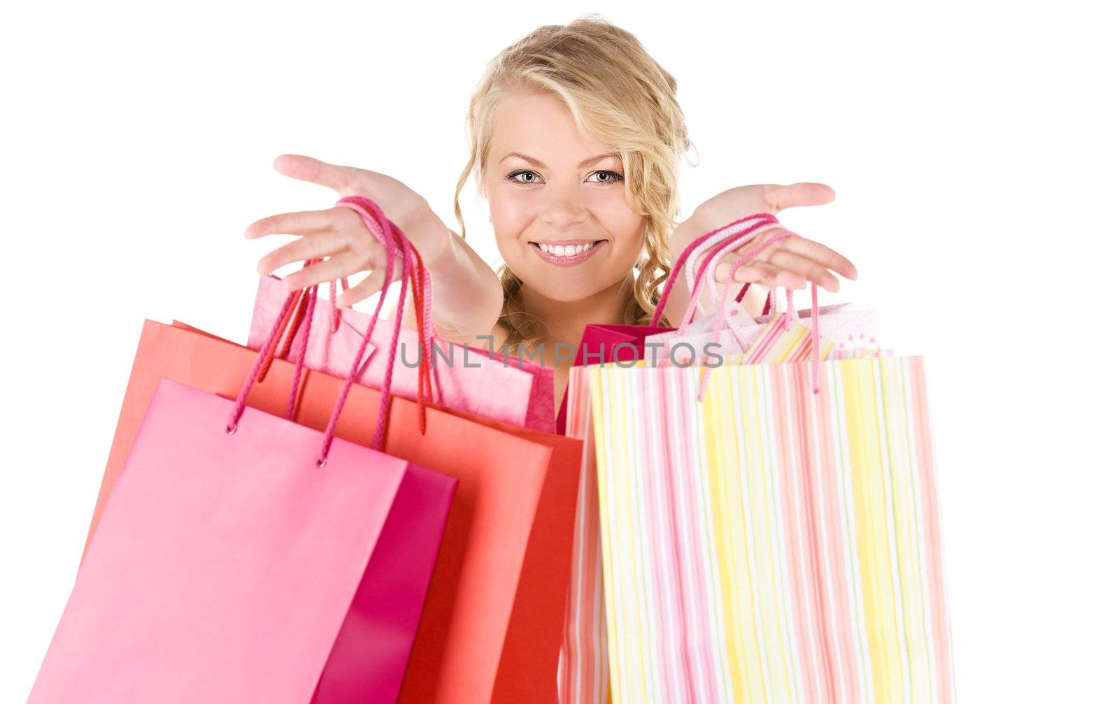 happy woman with shopping bags over white