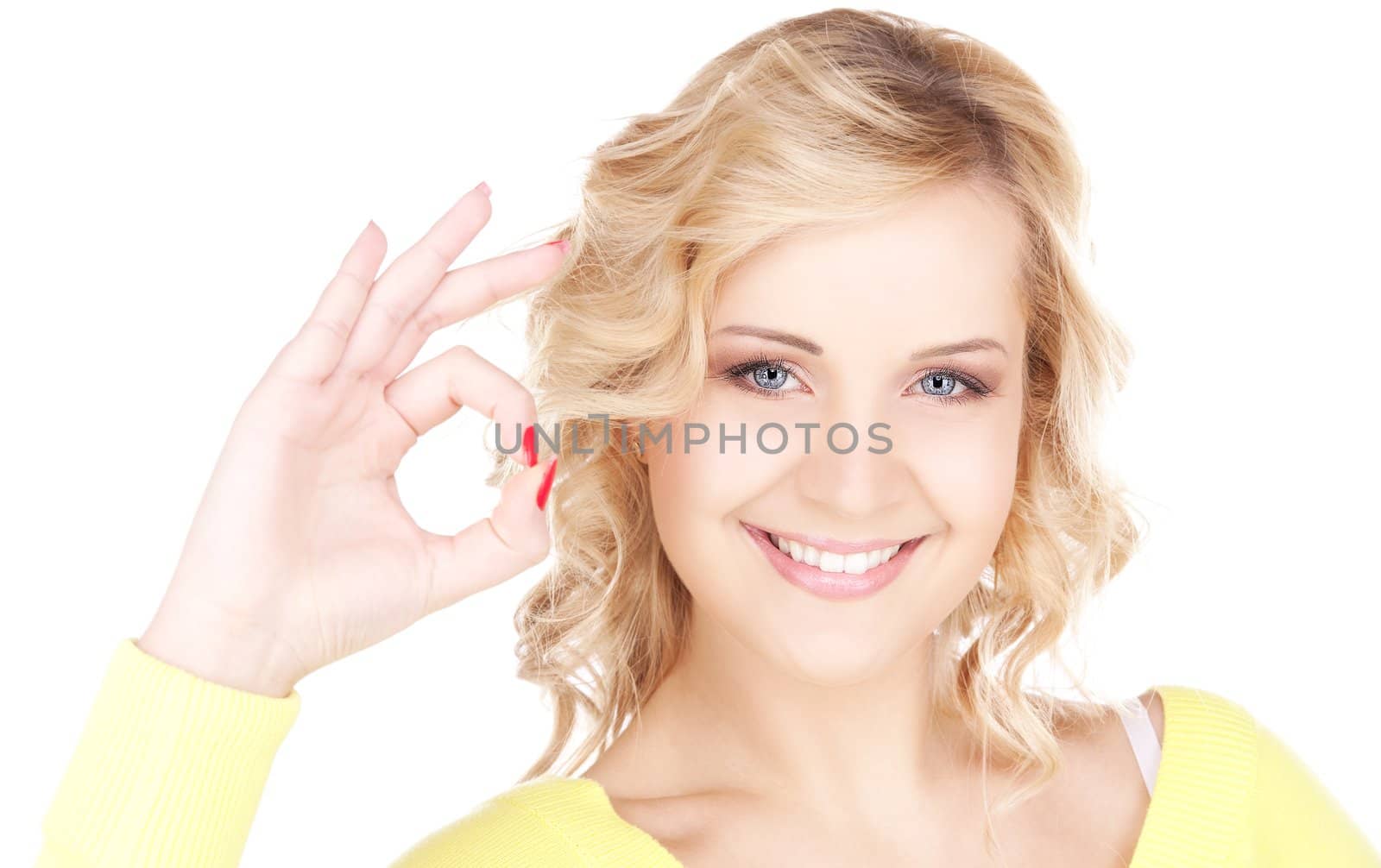 bright picture of lovely blonde showing ok sign