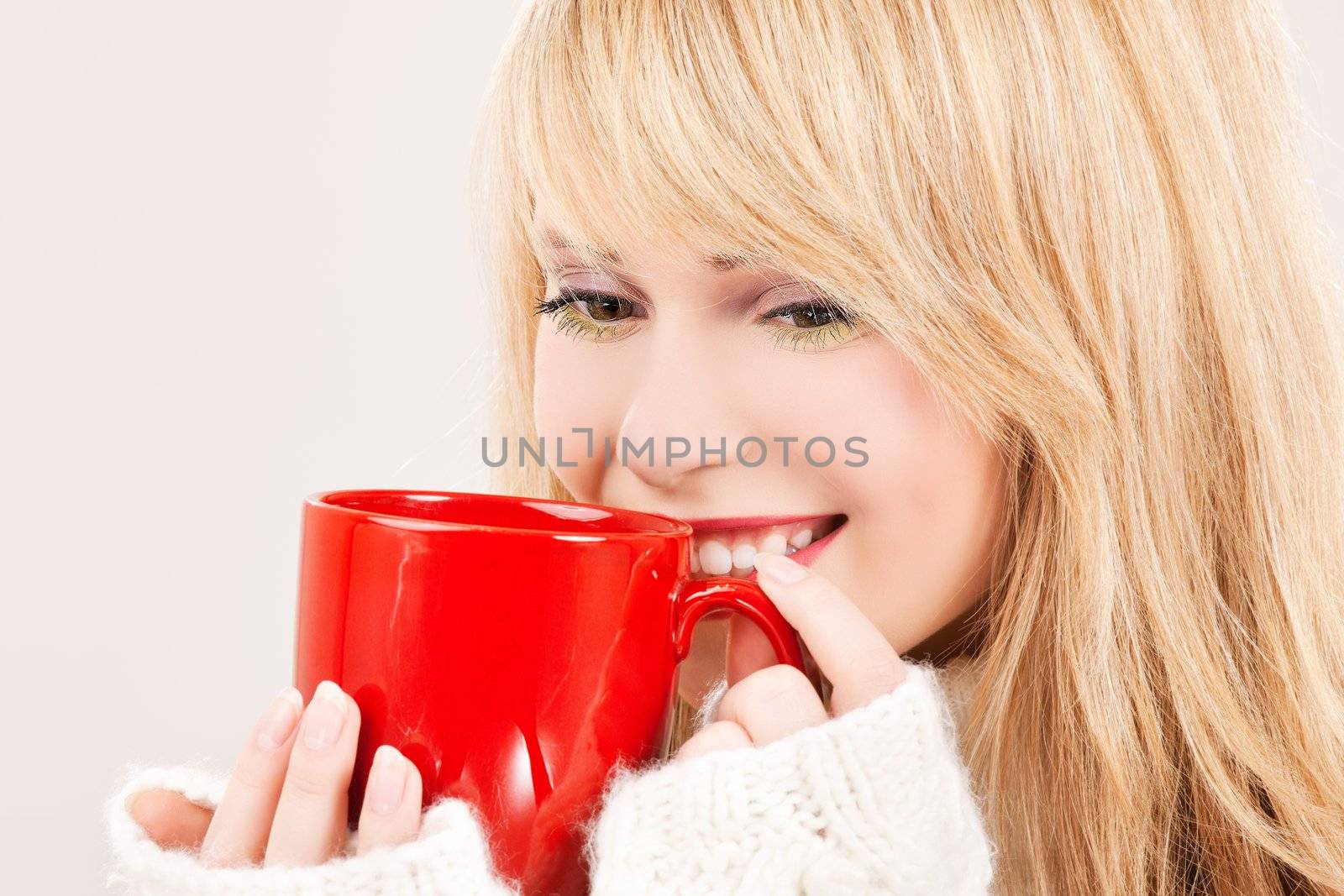 picture of happy teenage girl with red mug