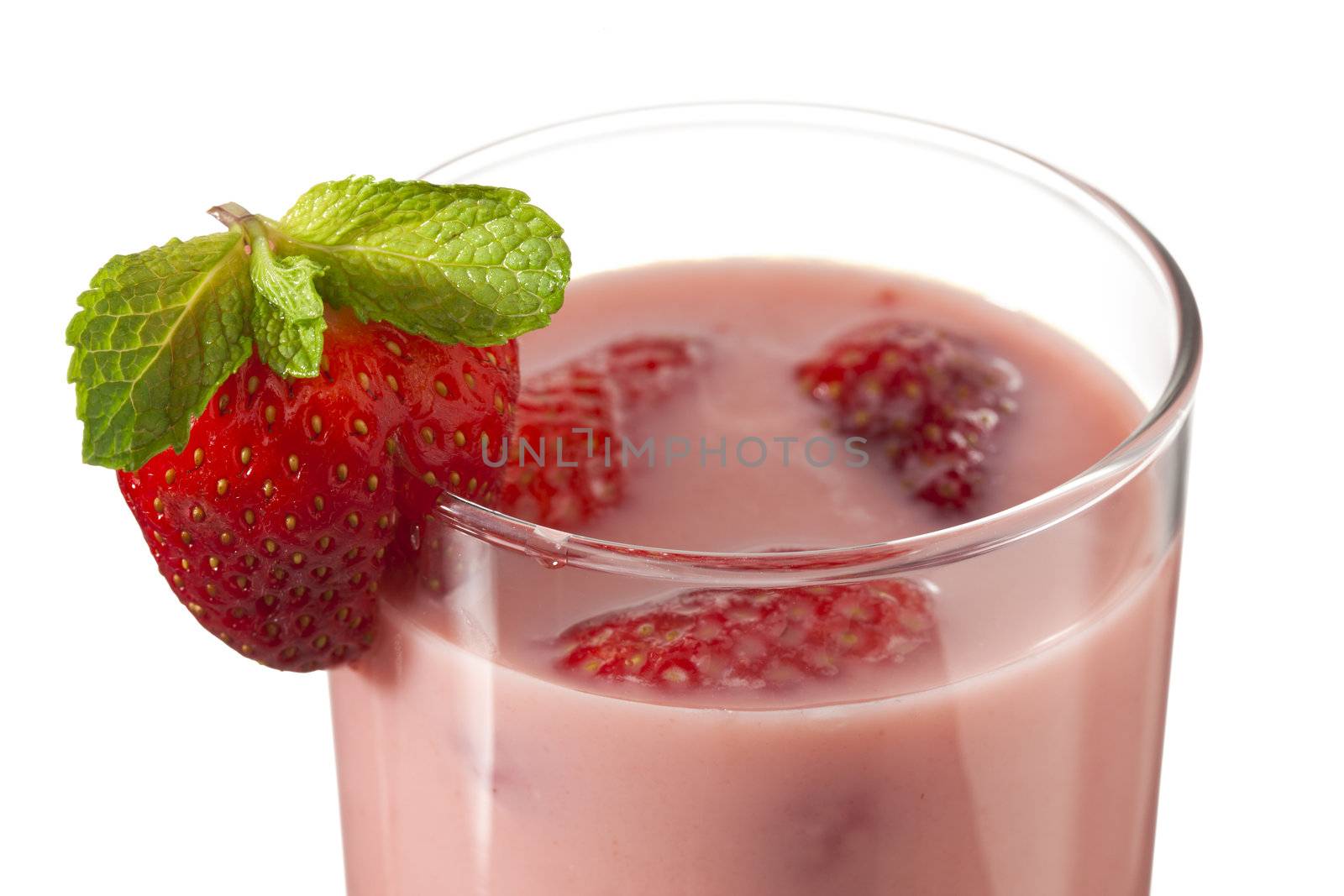Partial view of strawberry milkshake isolated on white background