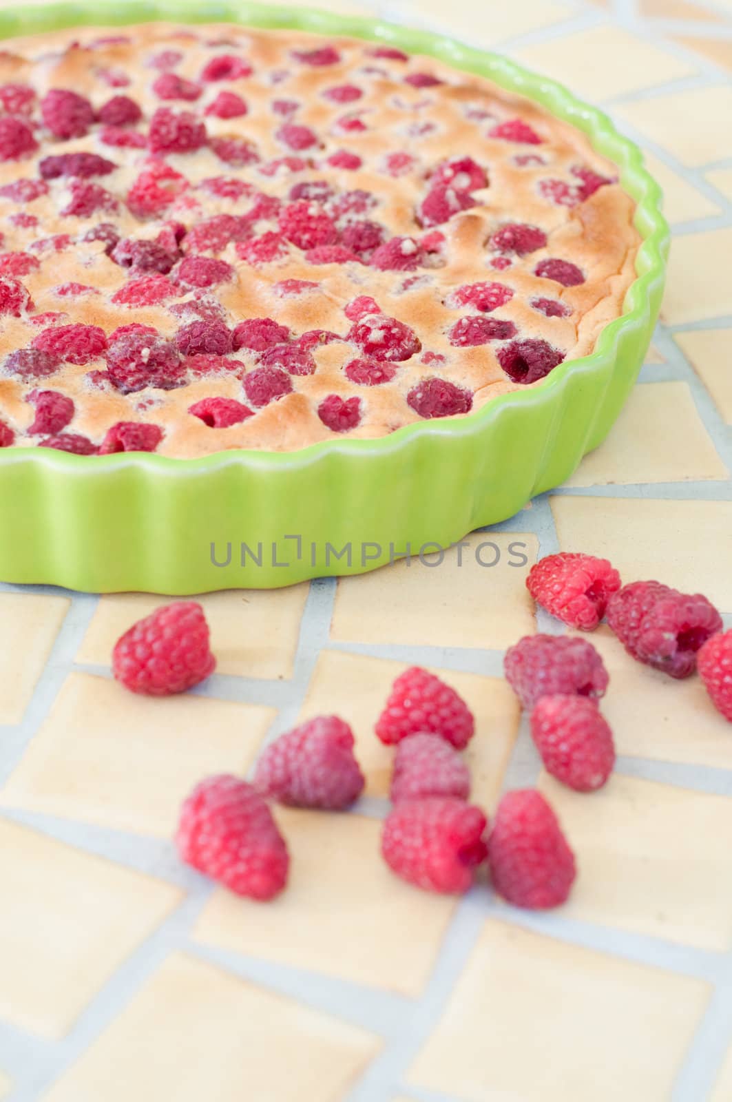 Shot of raspberry pie on the table