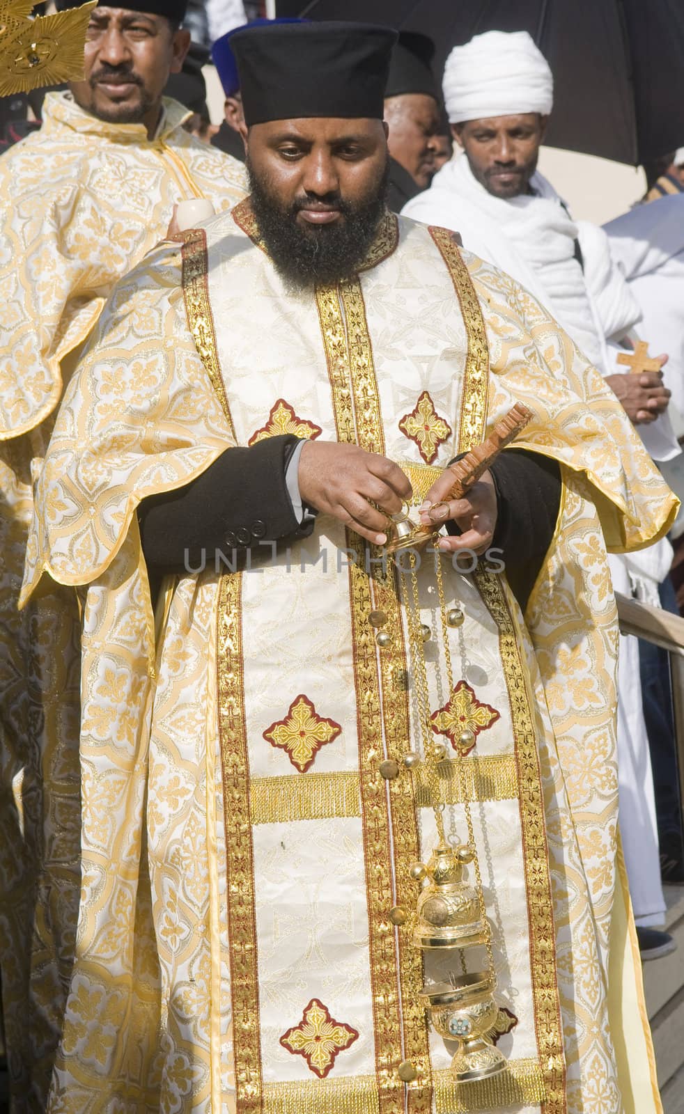 QASER EL YAHUD , ISRAEL - JAN 19 : Ethiopian Orthodox priests participates in the annual baptising ceremony during the epiphany at Qaser el yahud , Israel in January 19 2012