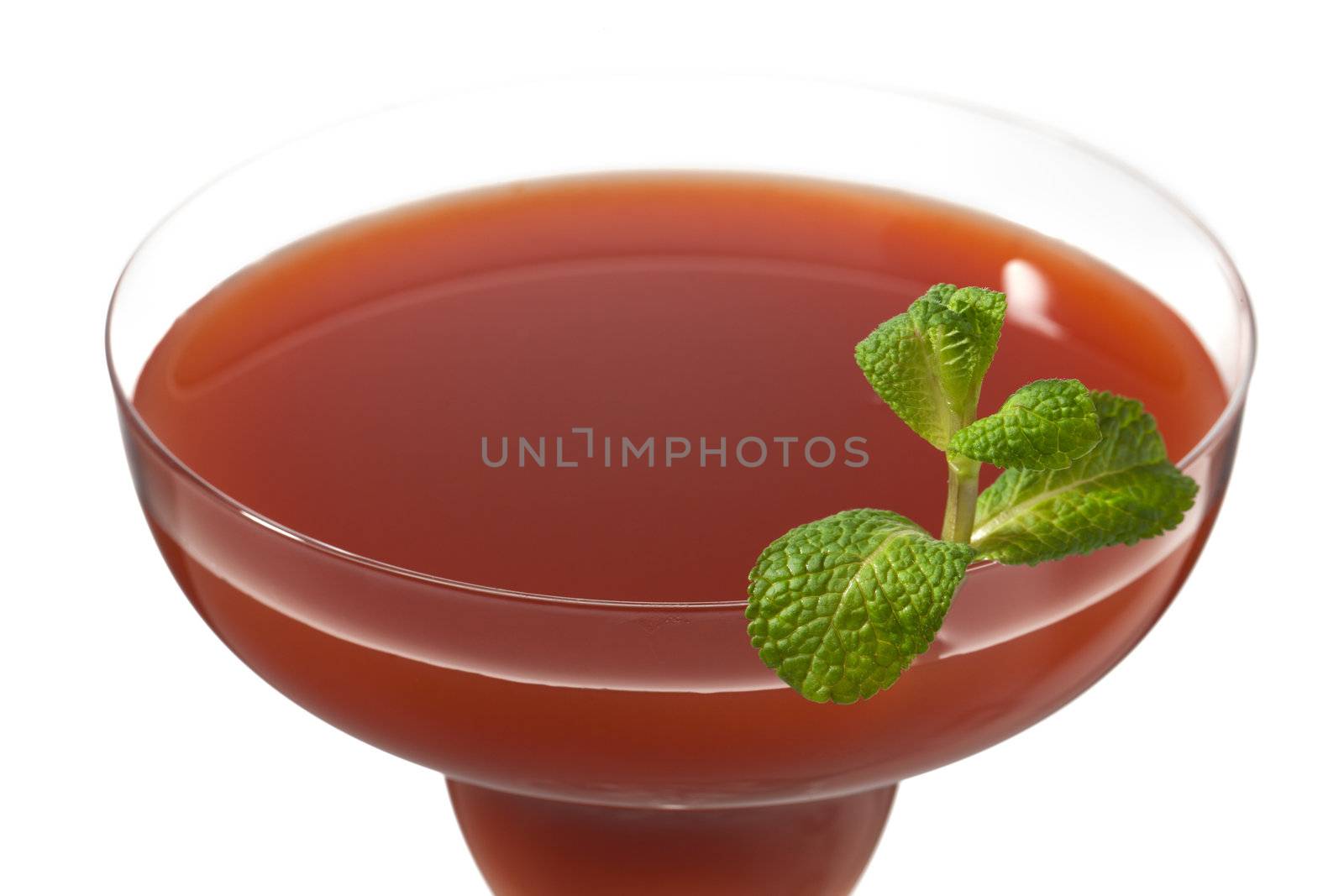 cropped image of strawberry juice in martini