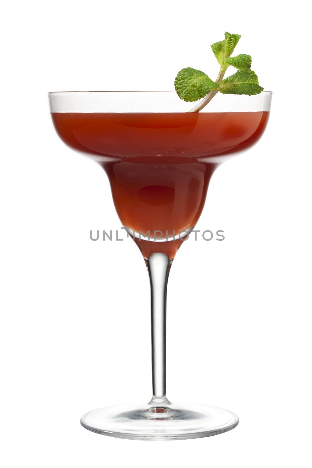 fruit juice in martini glass on a white background