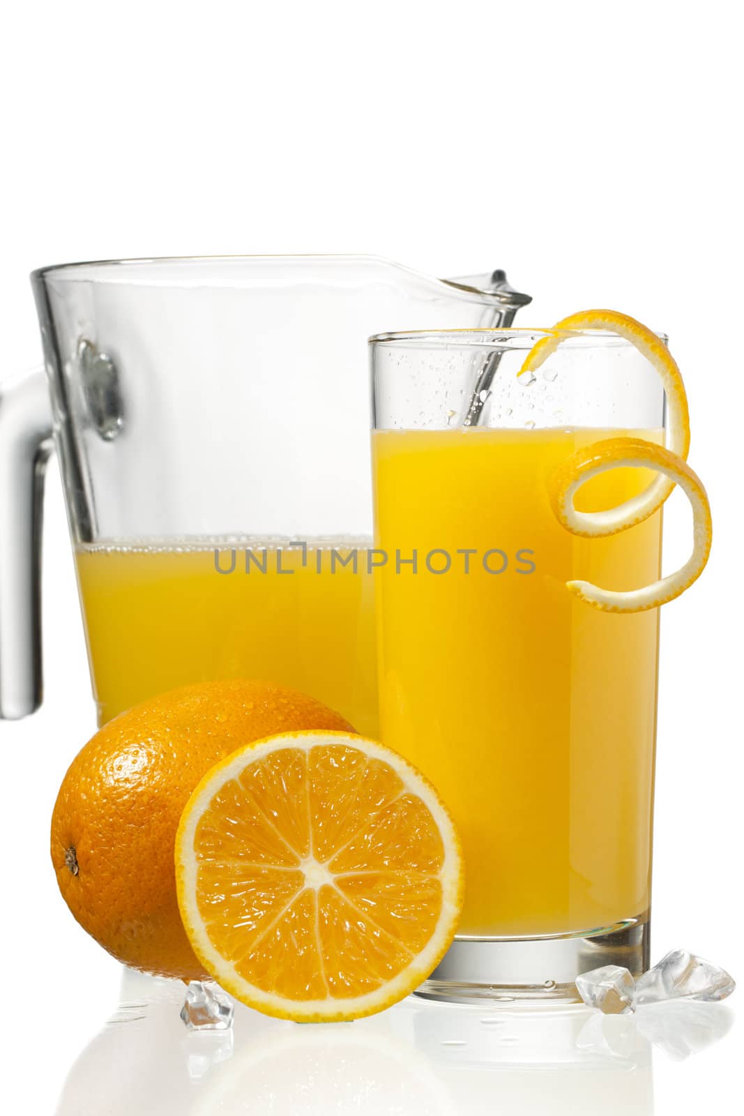 orange juice in glass and a jar by kozzi