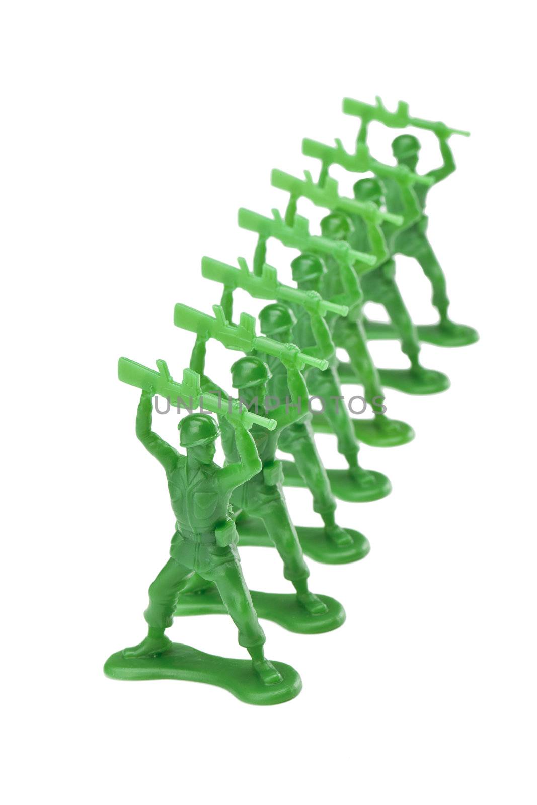 pieces of green toy soldiers isolated on white background