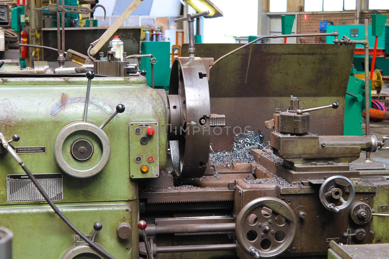 Old lathe in workshop of the plant