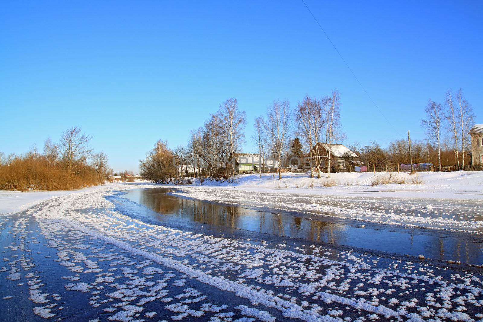 winter village on coast river