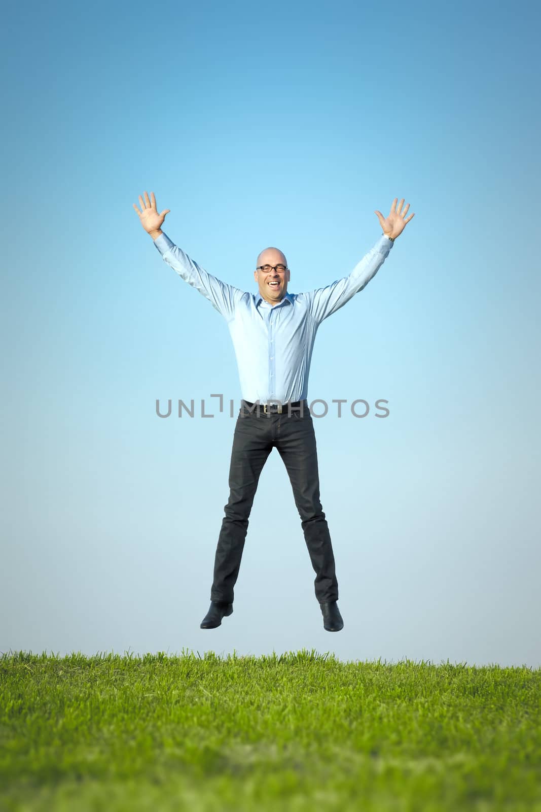 An image of a happy jumping man