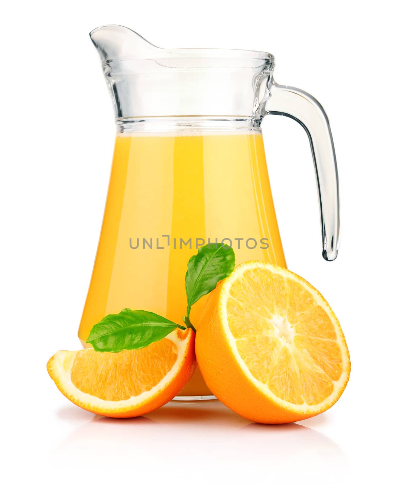 Jug of orange juice and orange fruits with green leaves isolated on white 