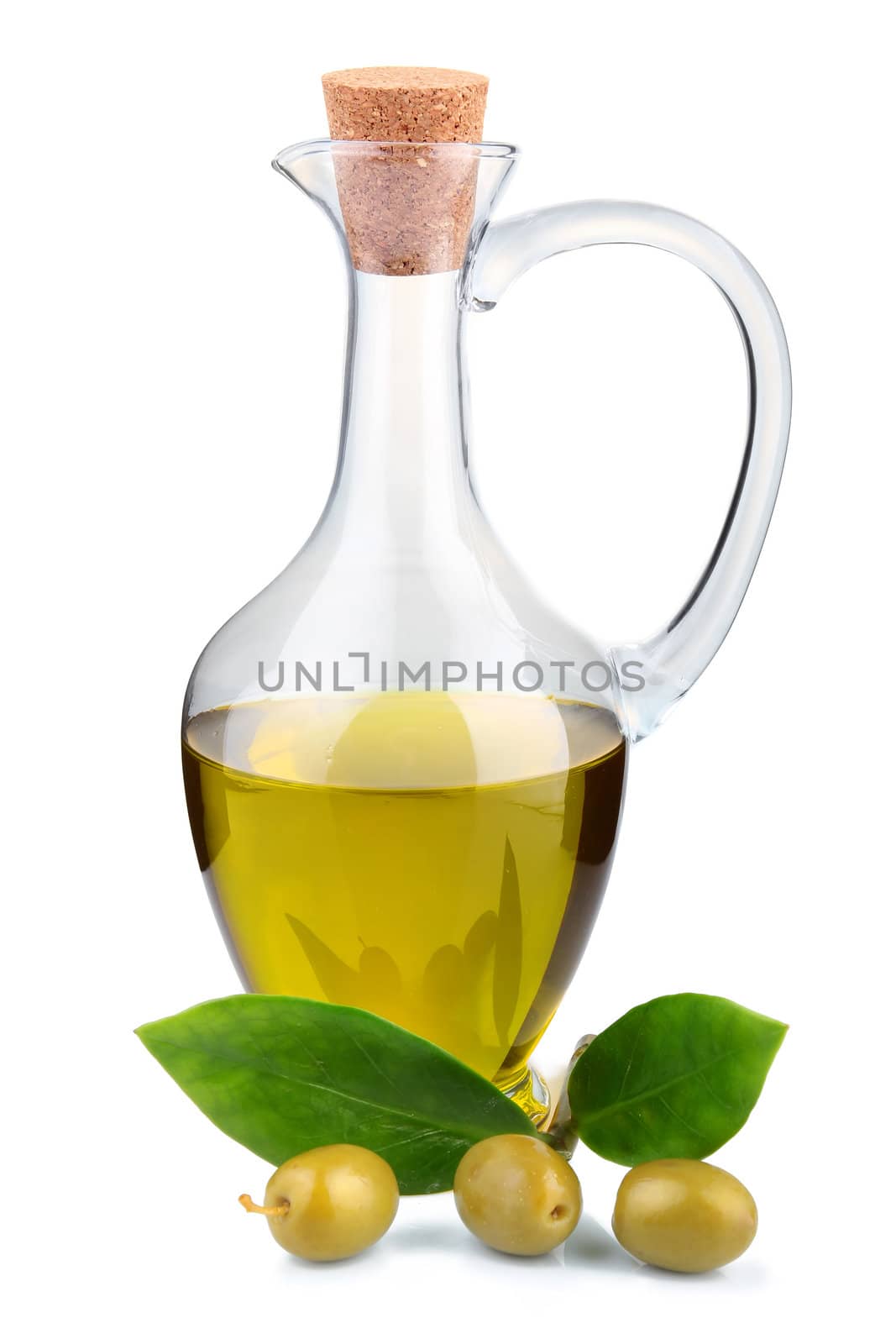 Branch with olives and a bottle of olive oil isolated on white