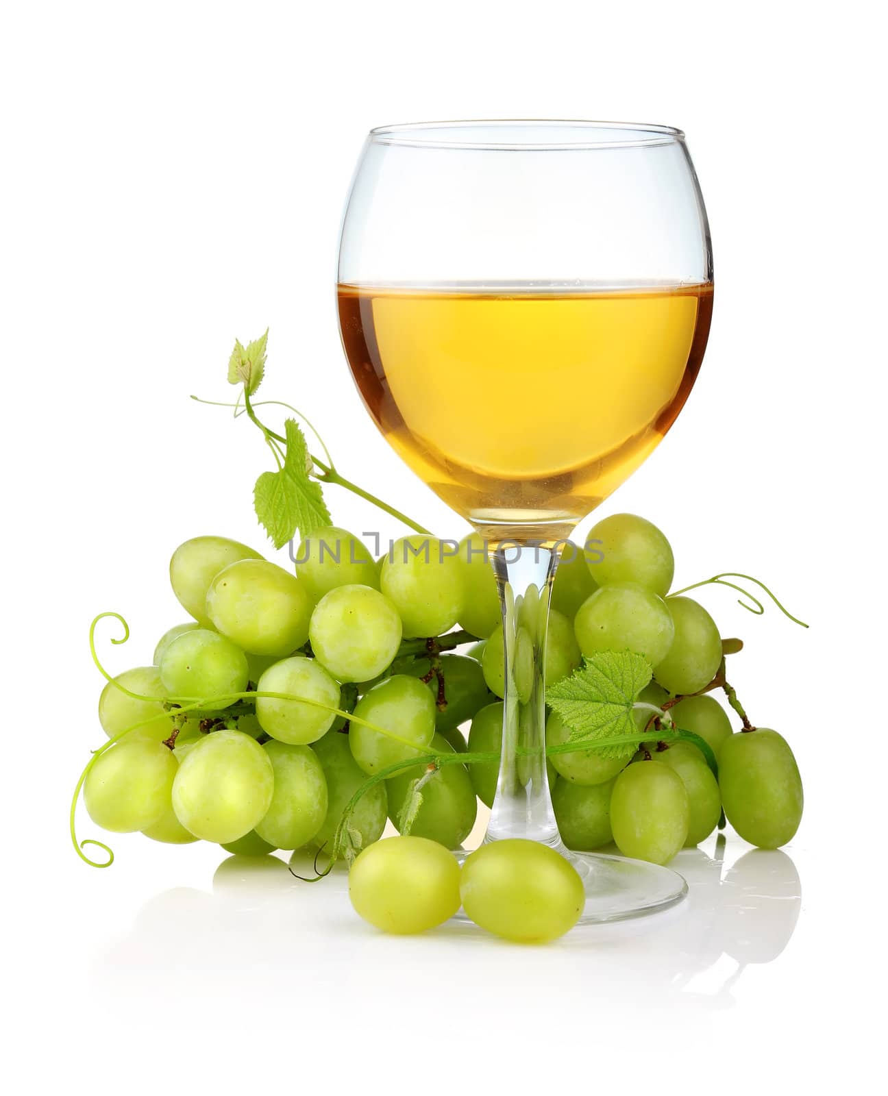 glass of wine and grape branch isolated on white background