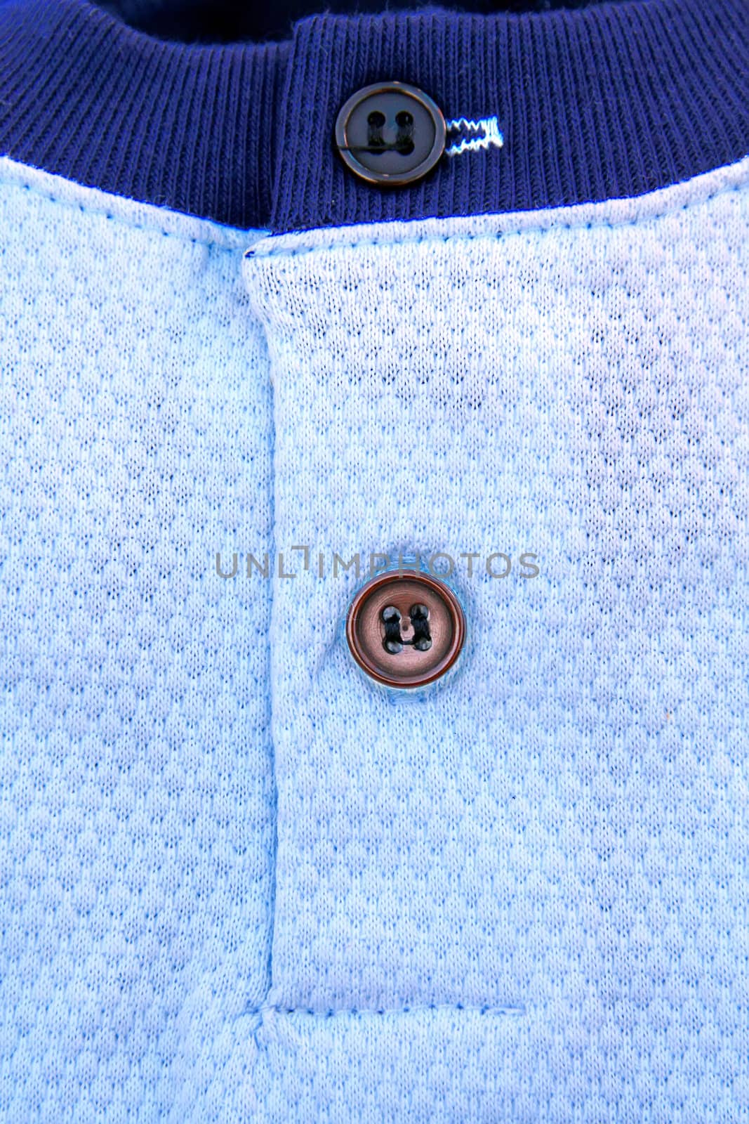A part of a shirt with buttons