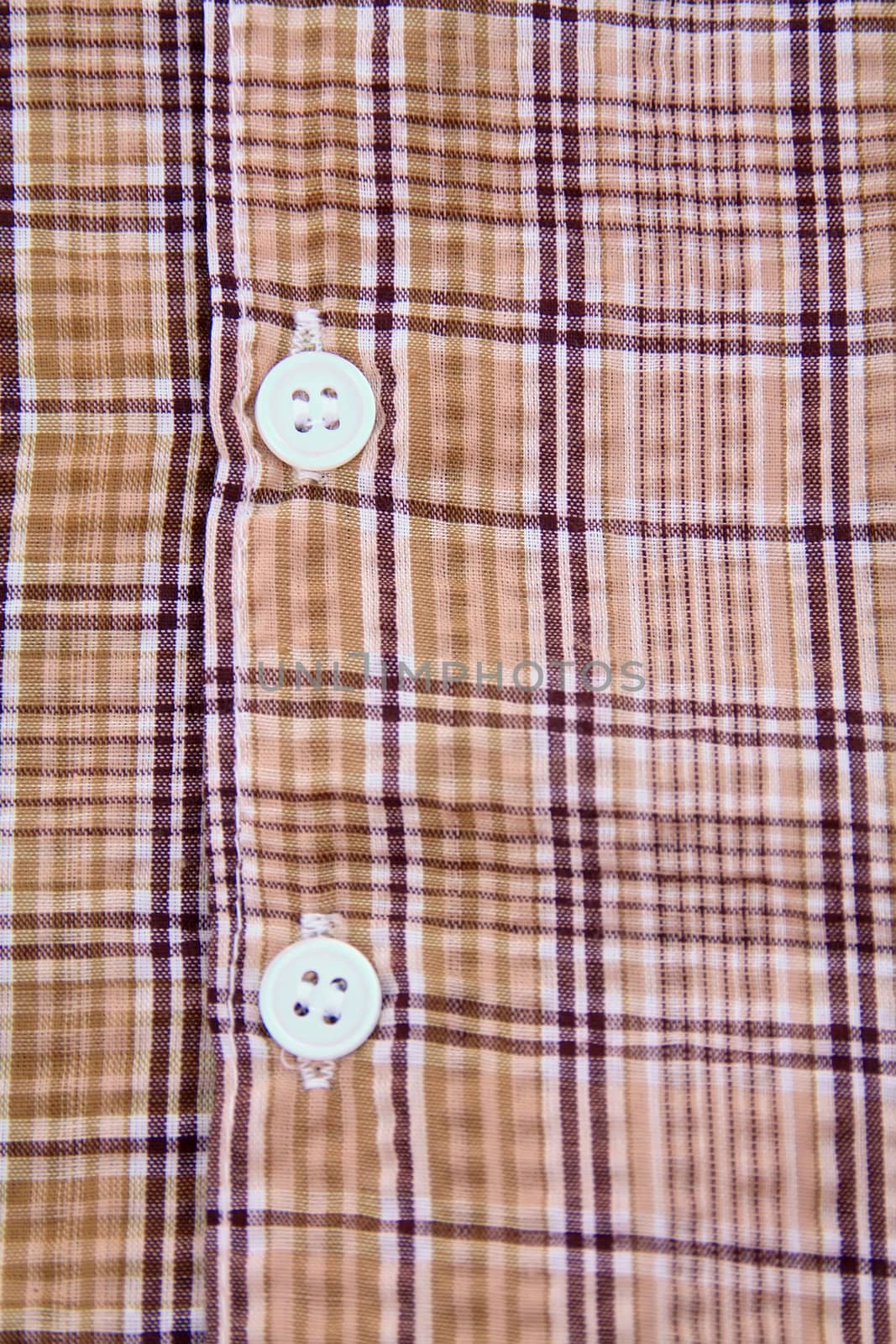 A part of a shirt with buttons