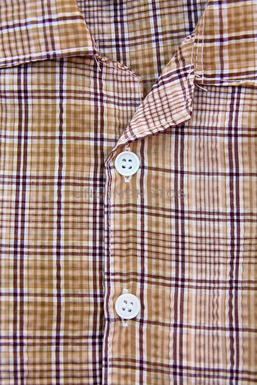 A part of a shirt with buttons