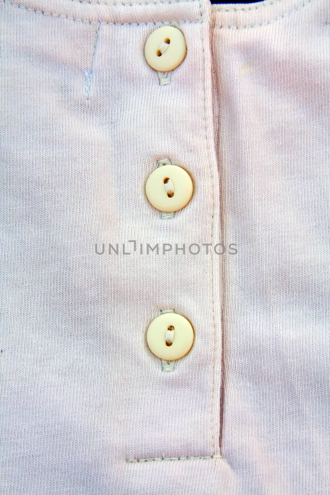 A part of a shirt with buttons