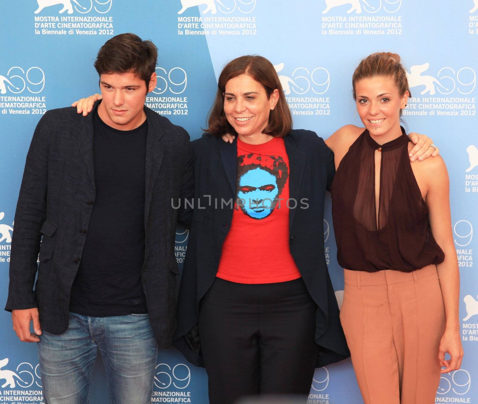 Filippo Scicchitano, Francesca Comencini and Giulia Valentini pose for photographers at 69th Venice Film Festival