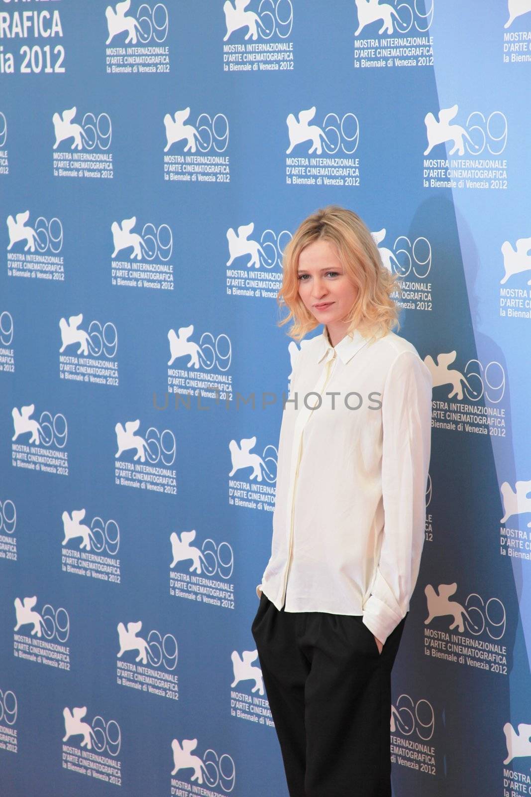 Christa Theret poses for photographers at 69th Venice Film Festival
