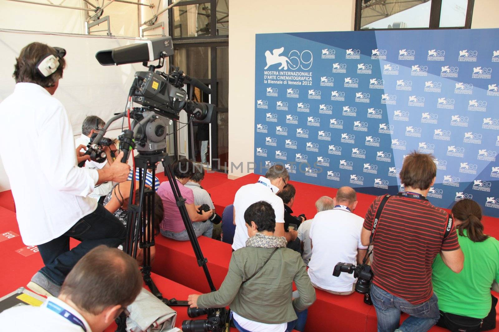 Waiting for the next celebrity on the red carpet at 69th Venice Film Festival