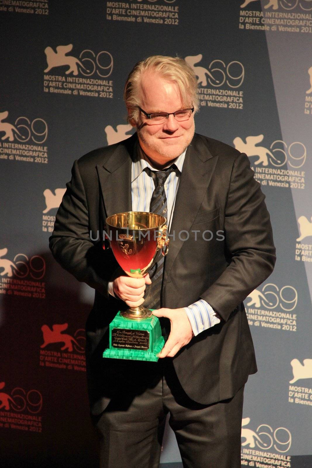 Philip Seymour Hoffman poses for photographers at 69th Venice Film Festival