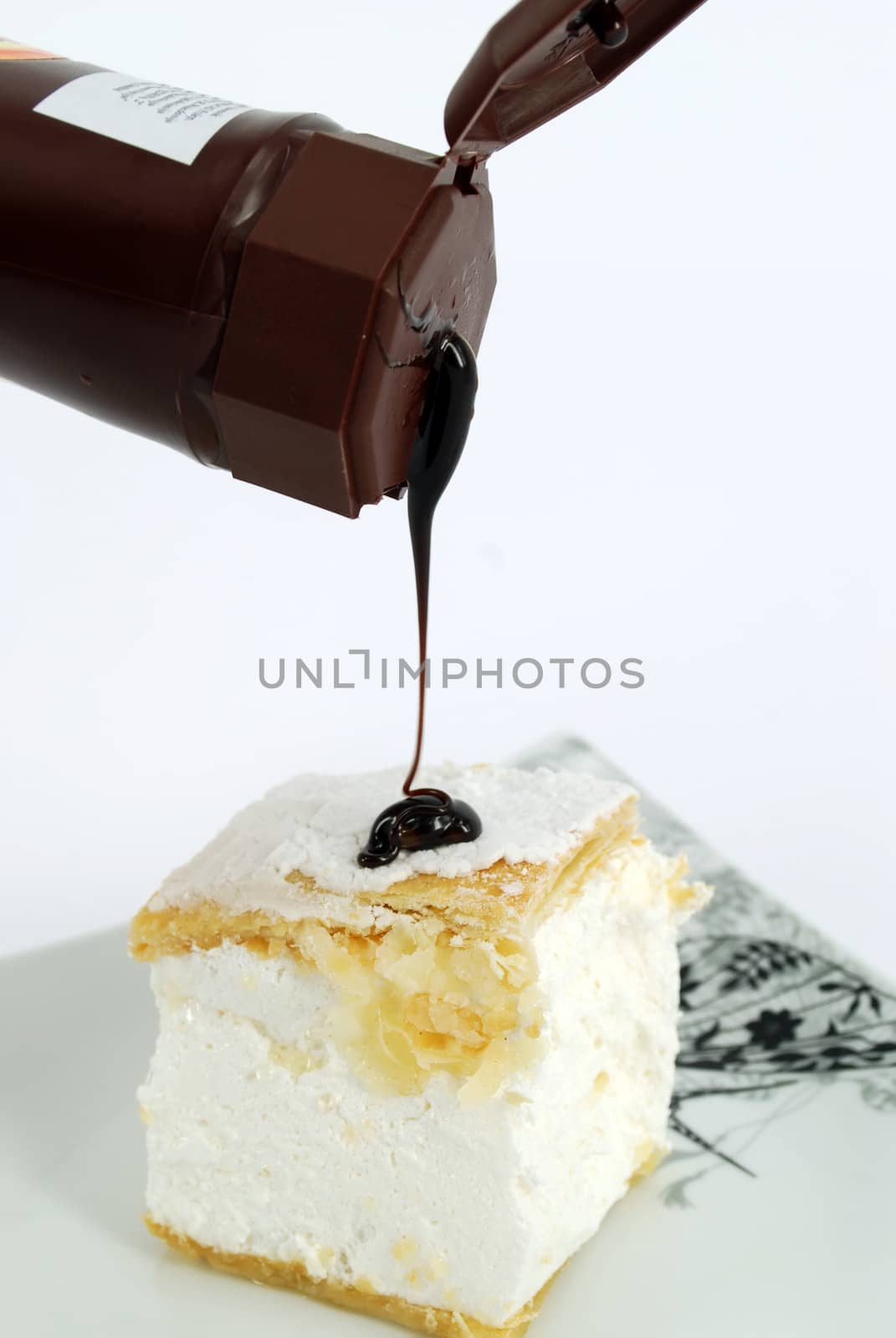 Sweet cake with chocolate cream