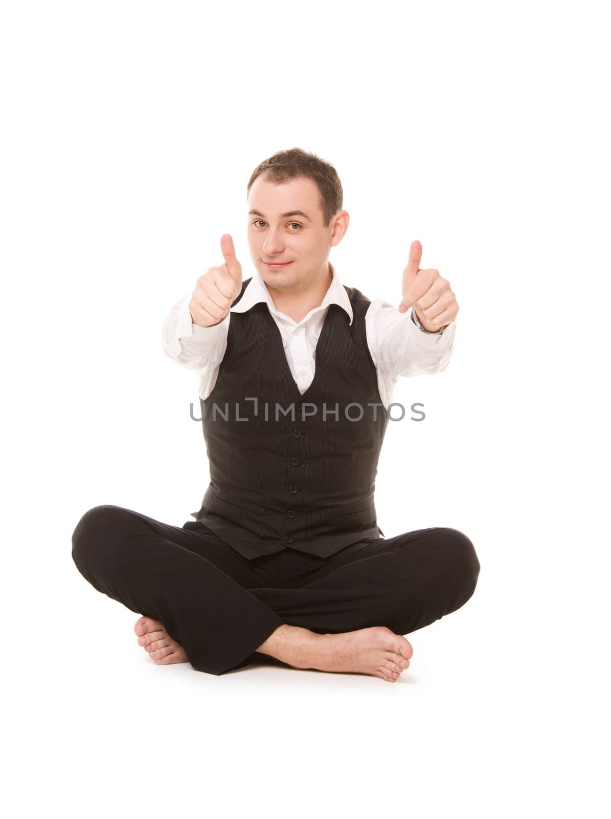 businessman sitting in lotus pose by dolgachov