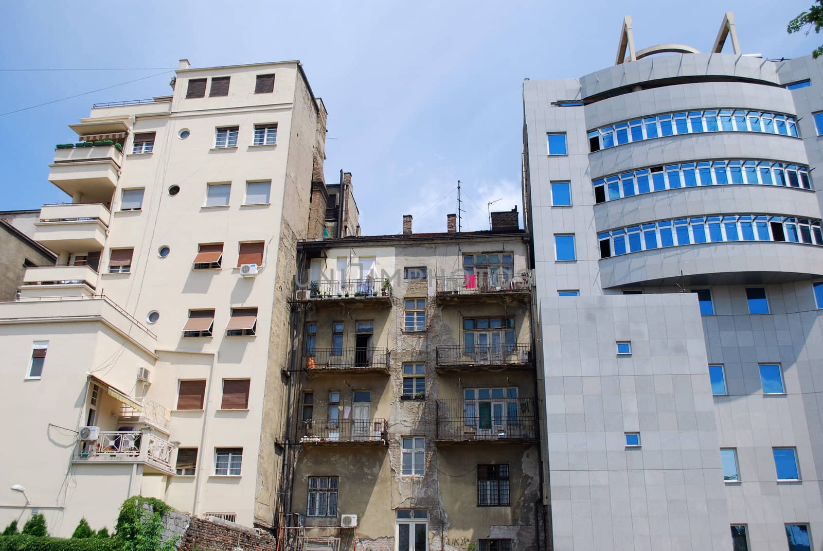 Old building between modern architecture