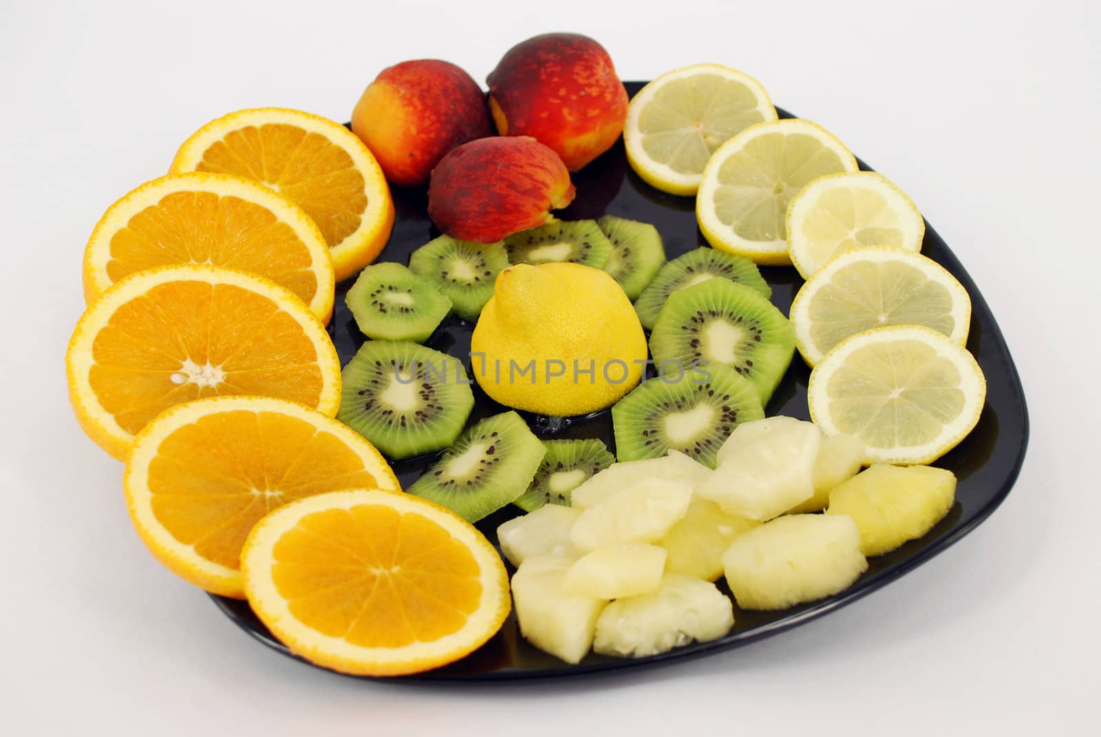 Orange lemon peach pineapple kiwi fruit