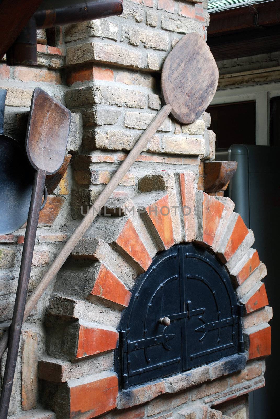 Old bakery brick stove with peel