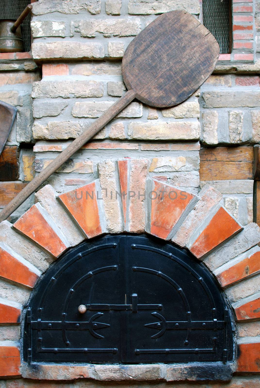 Old bakery brick stove with peel