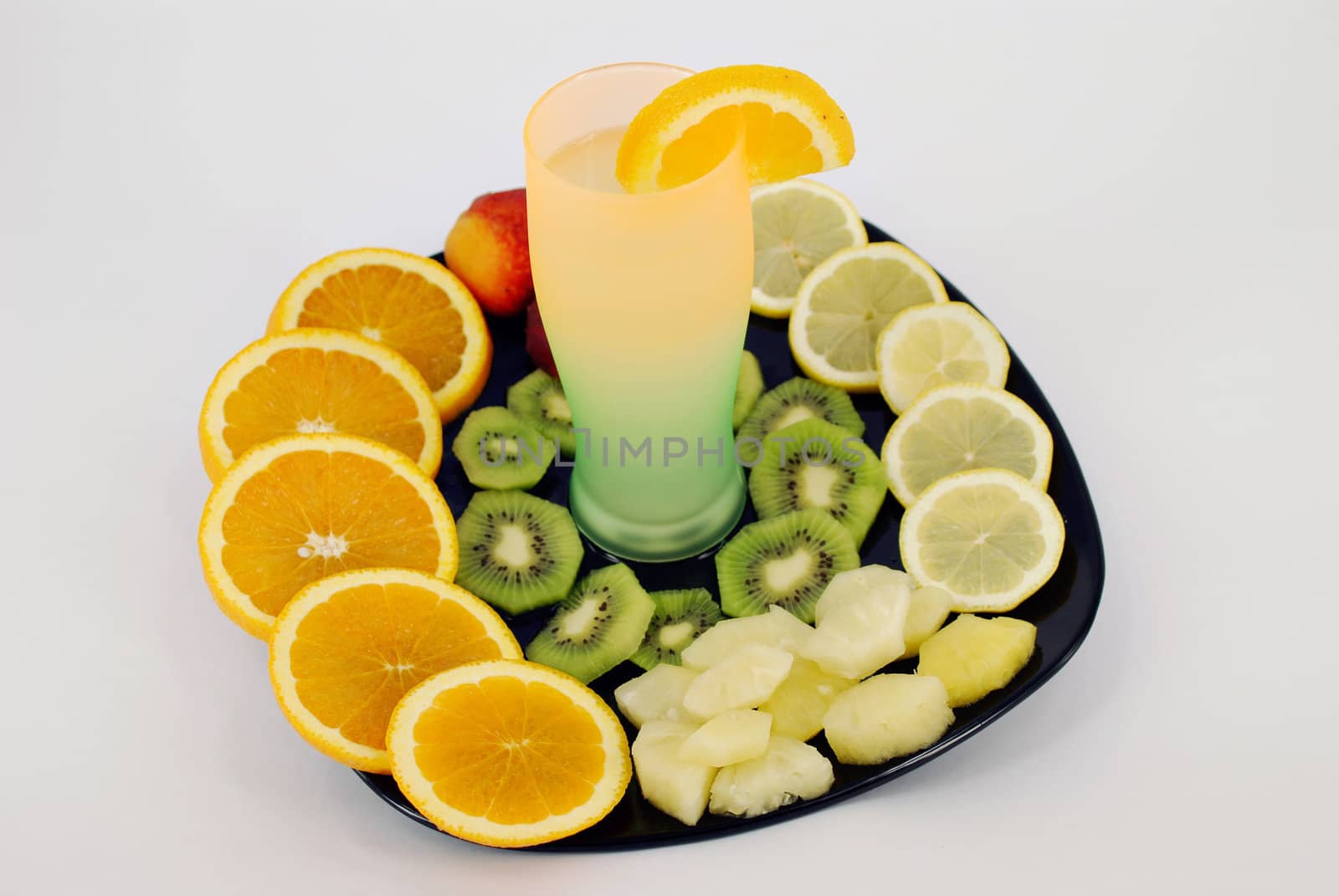 Fresh lemonade with different fruit