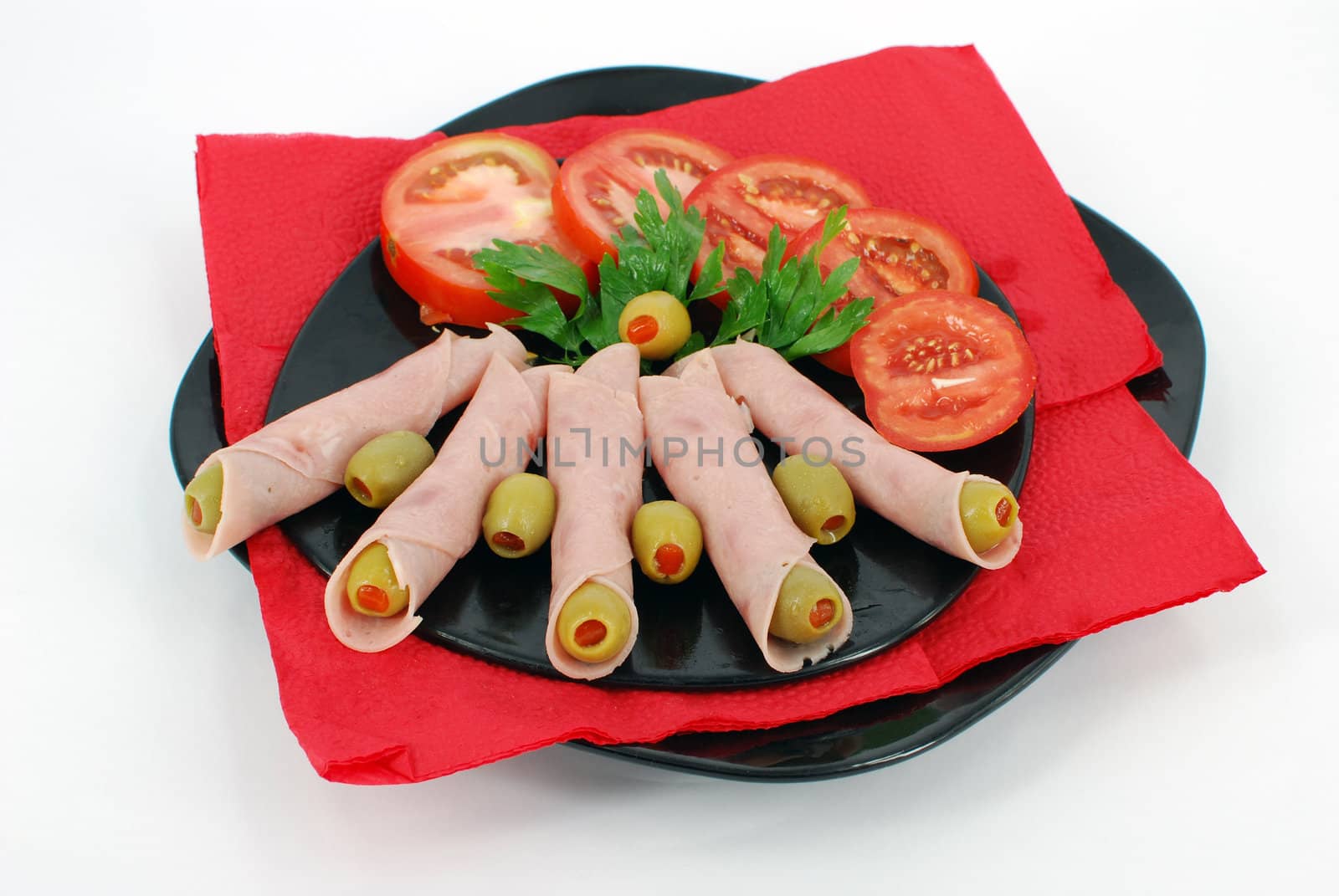 Delicatessen food with tomatoes and olives