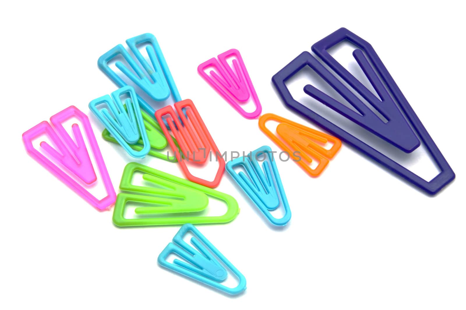 Colorful paper-clips isolated on white backgorund 
