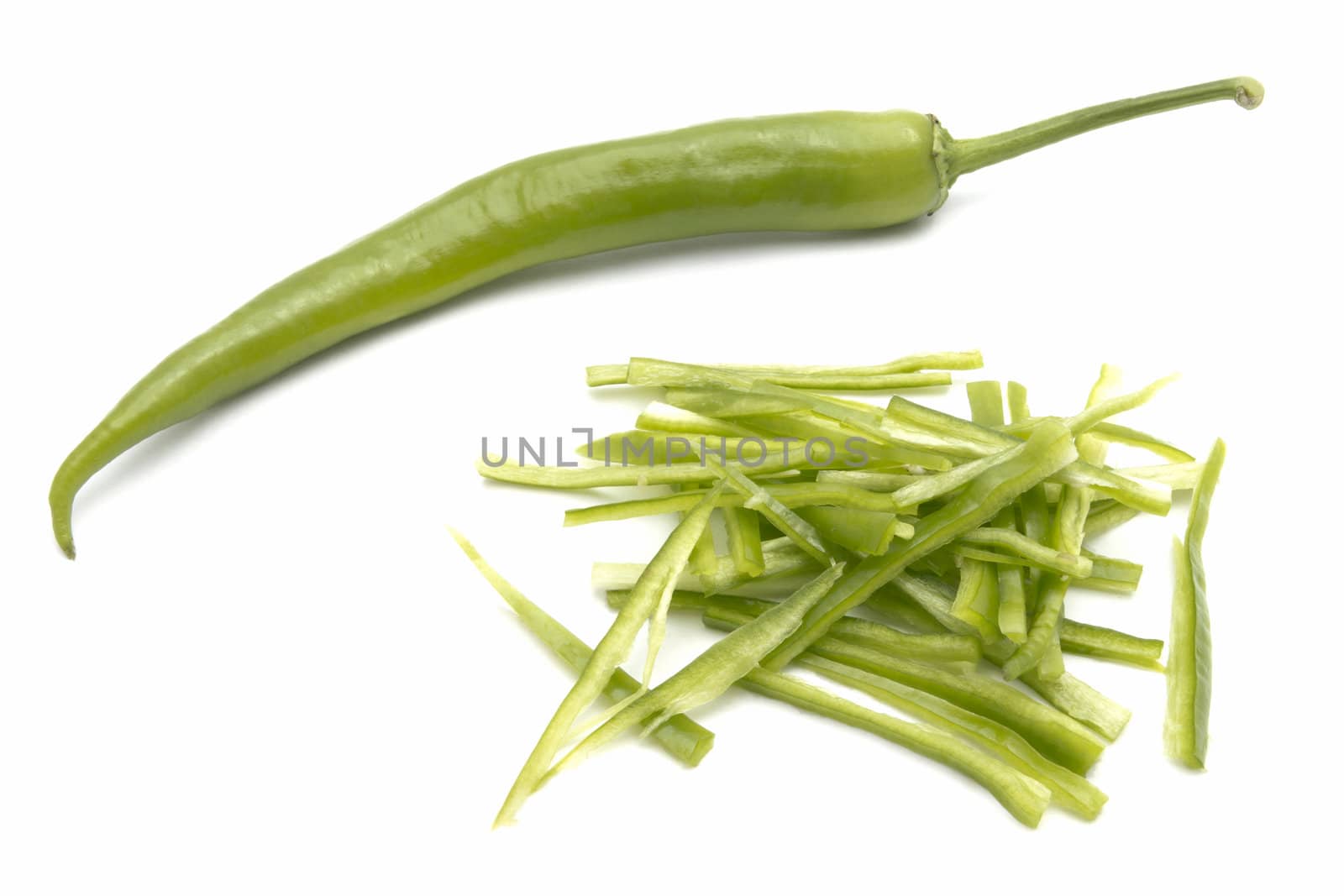 Fresh green chili close up on white background