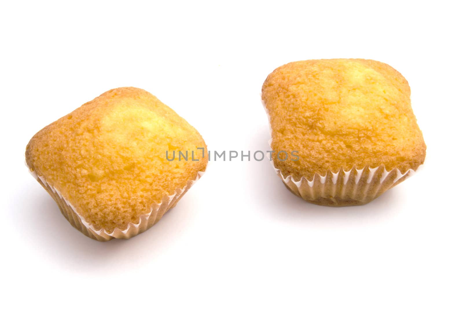 Delicious muffins isolated on white background