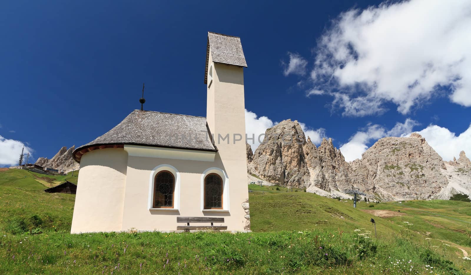 small chapel beneath Cir Dolomites in Gardena pass, Italy
