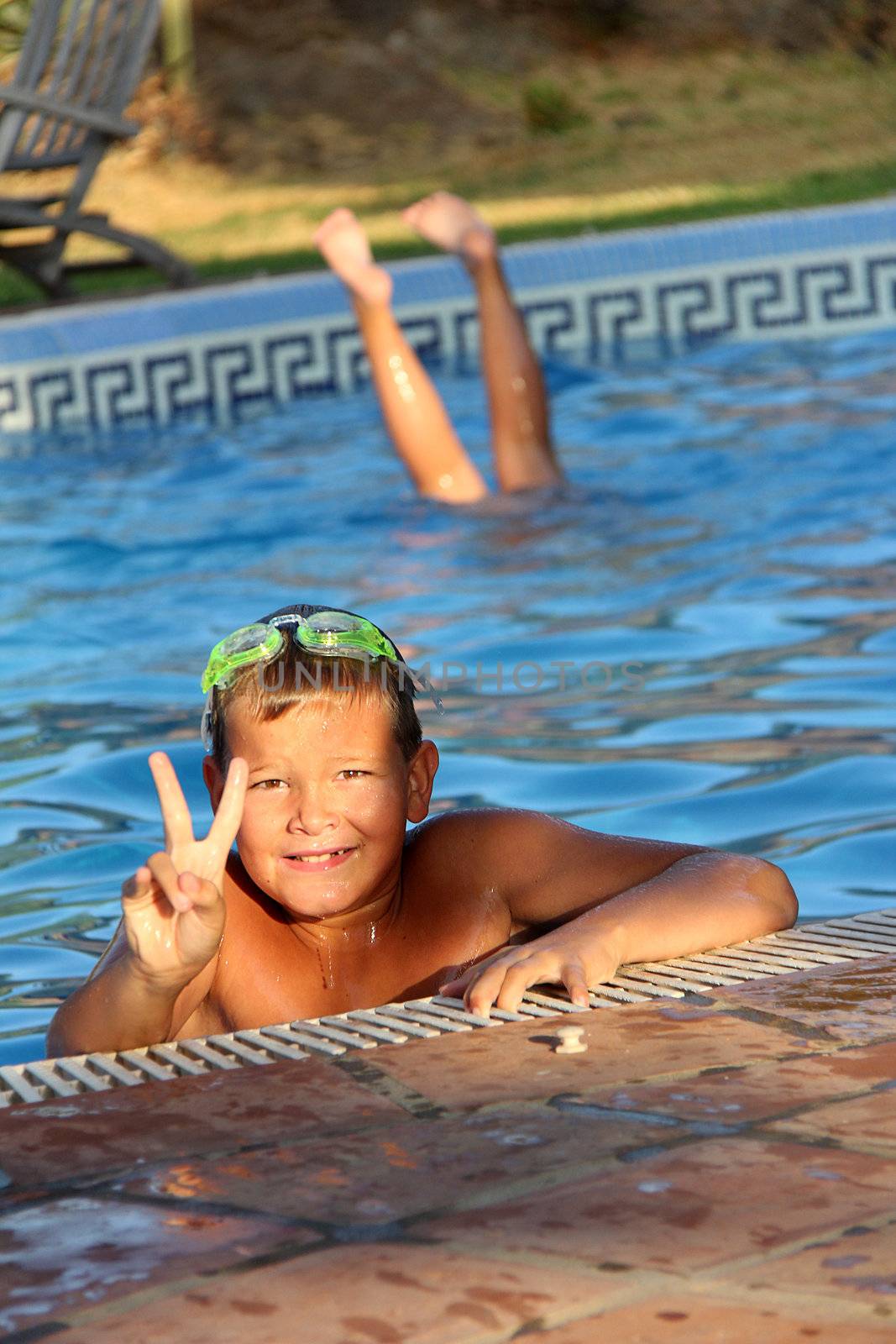 Tropical Scene with swimming pool and kids