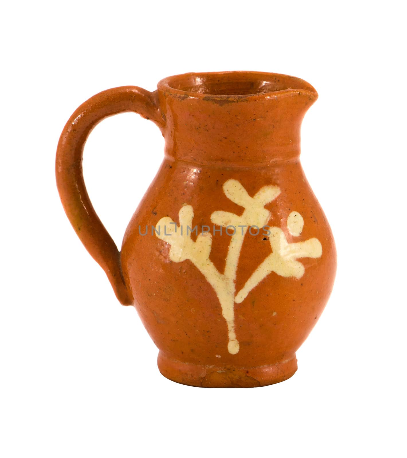 Retro clay pitcher brown color object with handle and ornaments isolated on white background. Home handmade decoration.