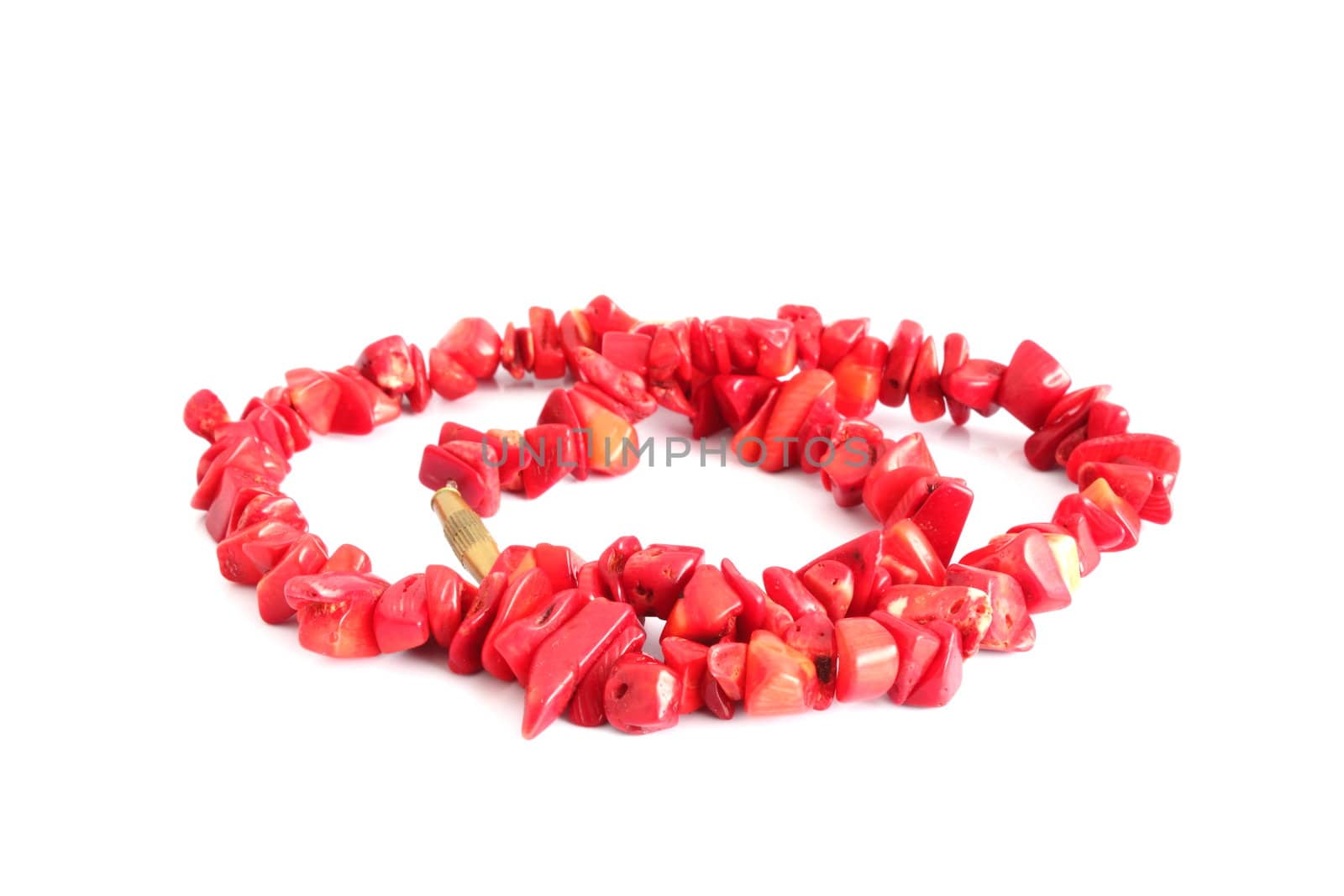 glamour jewel made from red coral over white background
