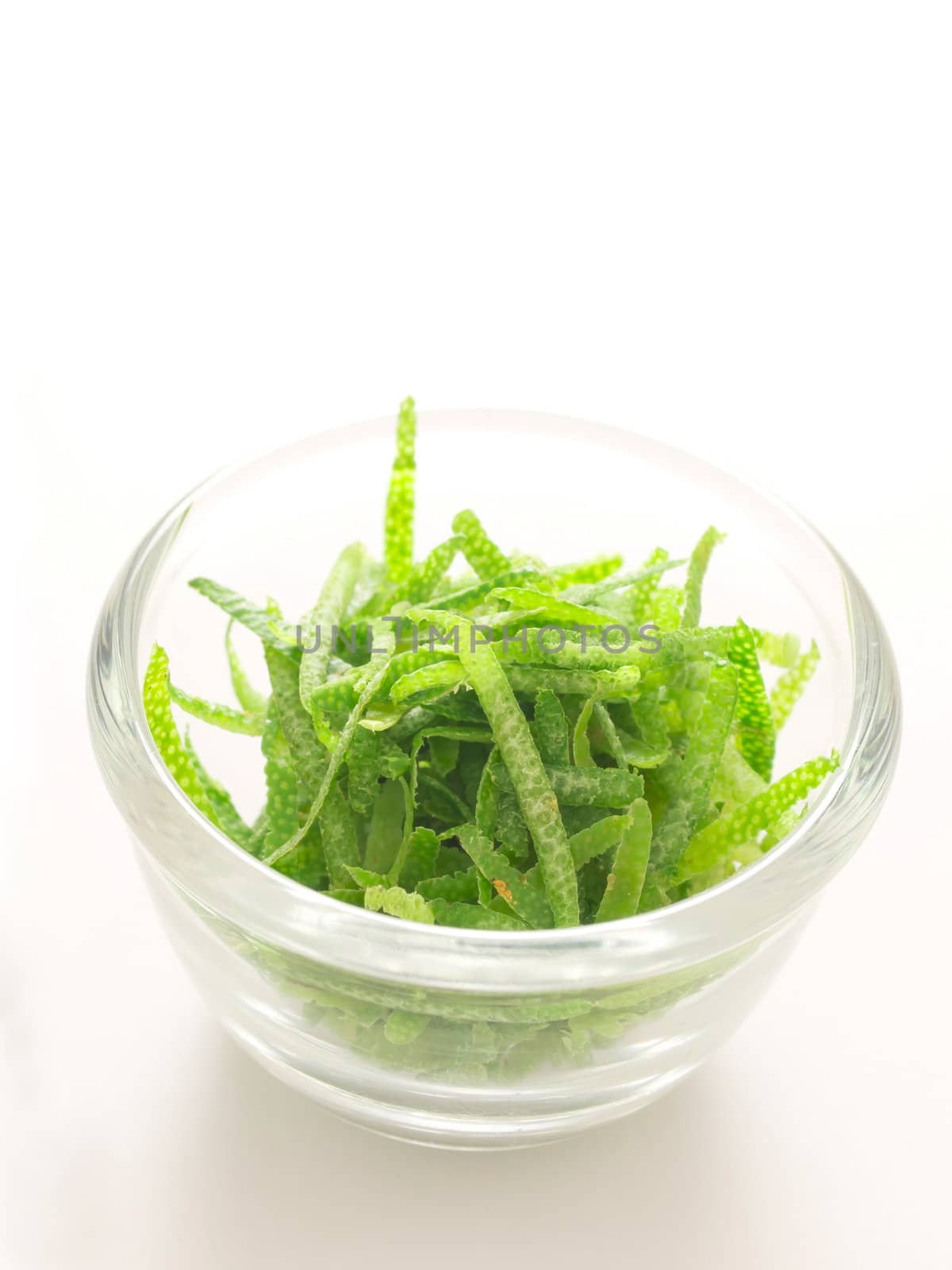 close up of a bowl of lime zest