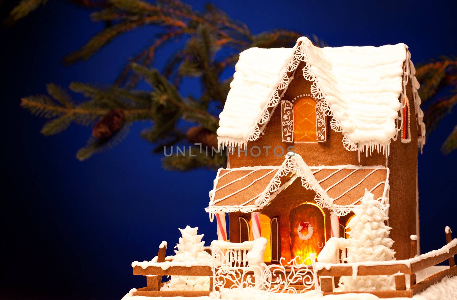 picture of gingerbread house over christmas background