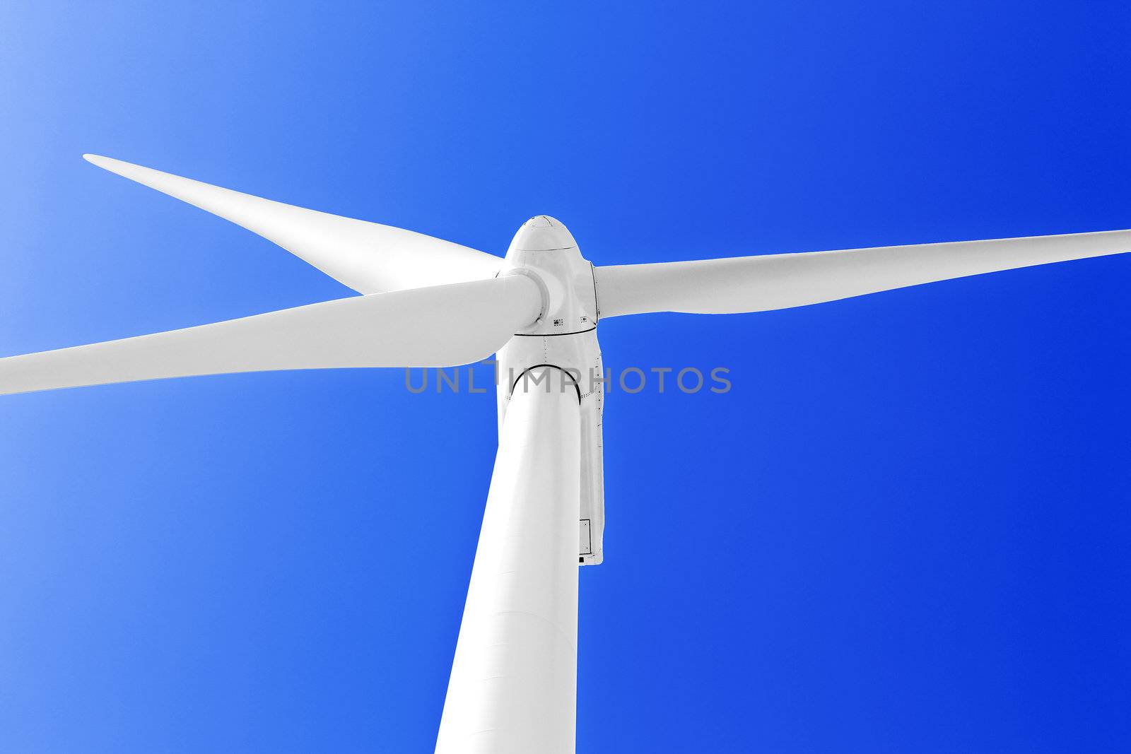 Wind turbine  at blue sky.