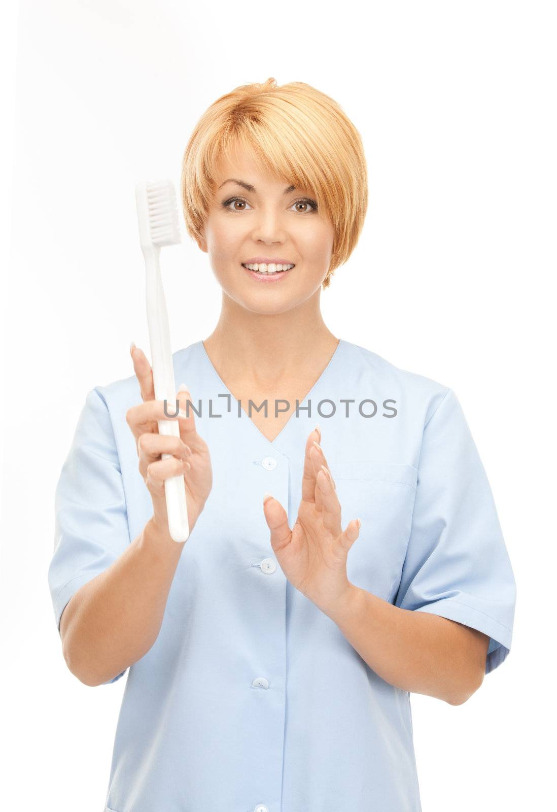 doctor with toothbrush by dolgachov