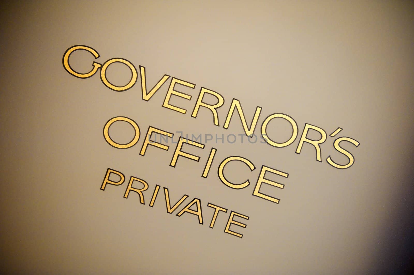 Old, hand painted lettering on the governor's door marked as private